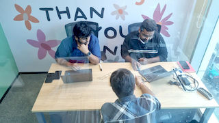 upGrad Guwahati office - student and parents with the counselling team after their study abroad session